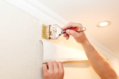 Pose de papier peint au Pailly — revêtements muraux et toiles de verre